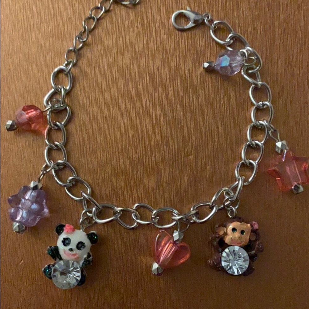 Children, panda and a monkey bracelet
